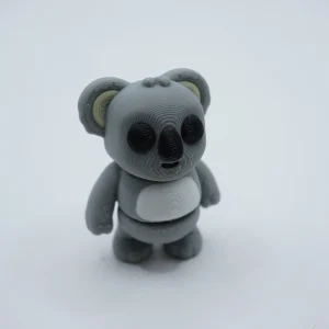 Koala articulado impreso en 3D en PLA+ gris, mini figura con puntos de articulación