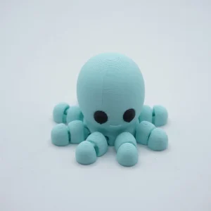 Pulpo articulado impreso en 3D en PLA+ celeste, tentáculos segmentados